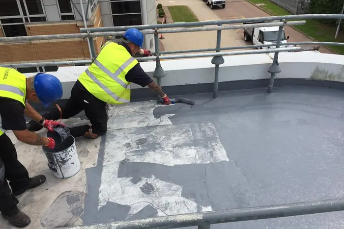 Liquid waterproofing over existing felt in Chesterfield — ARBOFLEX PU system applied over a sound covering, no strip-out