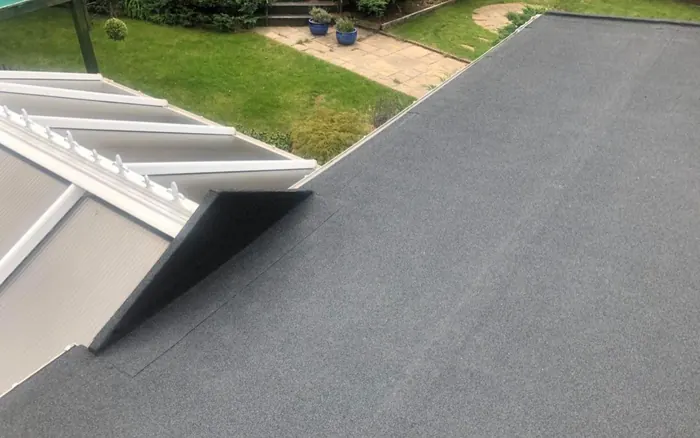 Extension with twin rooflights in Mansfield Woodhouse — New deck, insulation, rooflights and felt finish