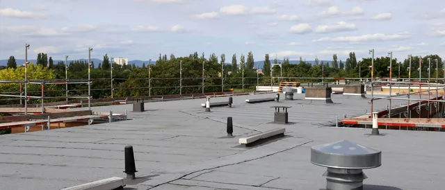 Balmoral Flat Roofing operatives working on a flat roof in Nottinghamshire