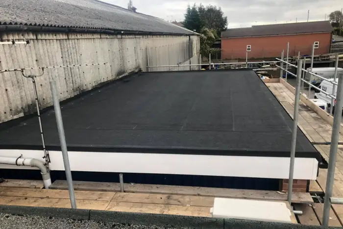 Large commercial felt roof — Mansfield — Completed system with outlets and edge trim