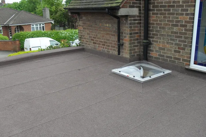 Extension with twin rooflights in Mansfield Woodhouse — New deck, insulation, rooflights and felt finish