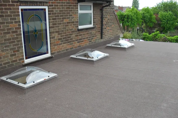 Rooflight upstand detailing — Sealed and dressed by hand